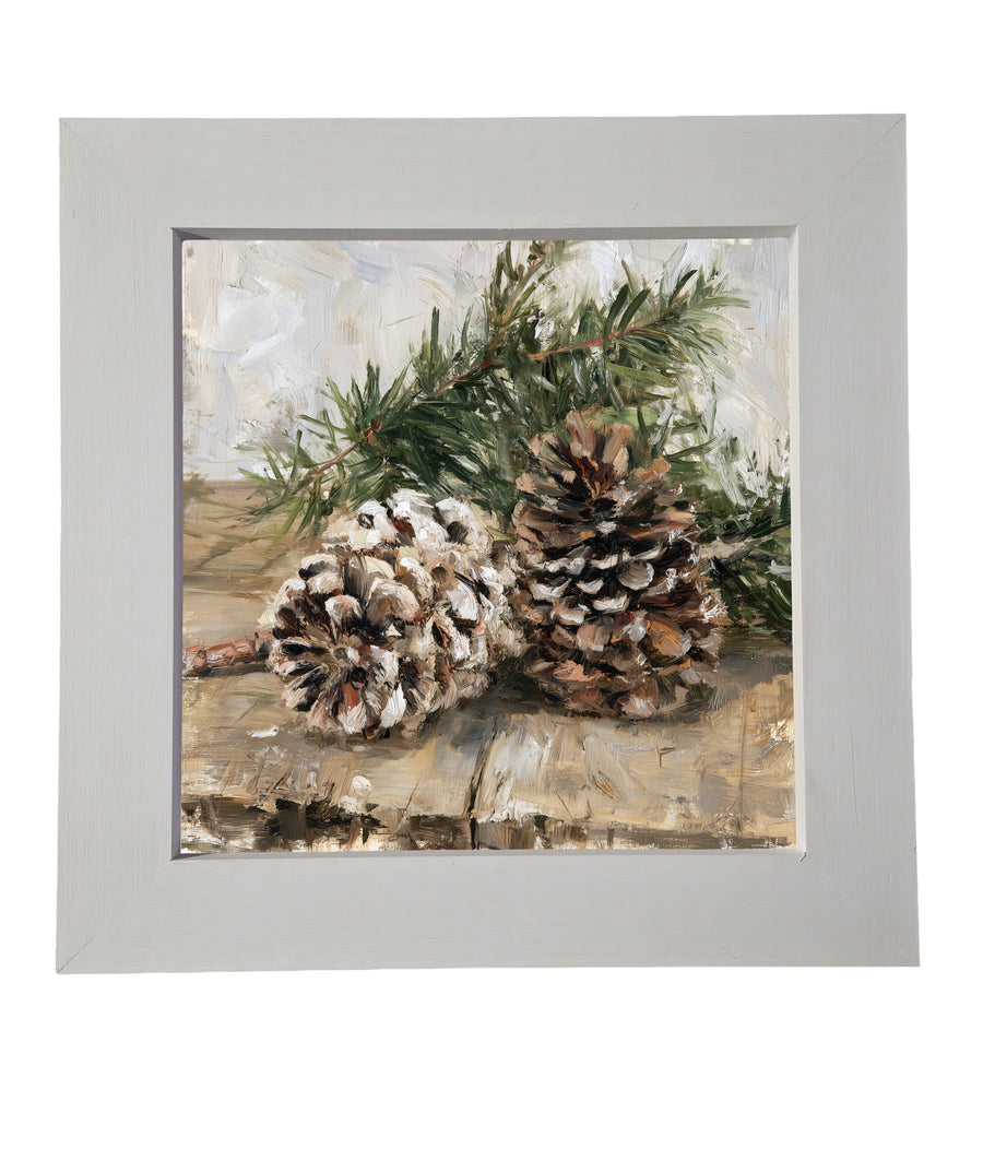Painterly artwork of pinecones and a pine branch on a rustic wooden table