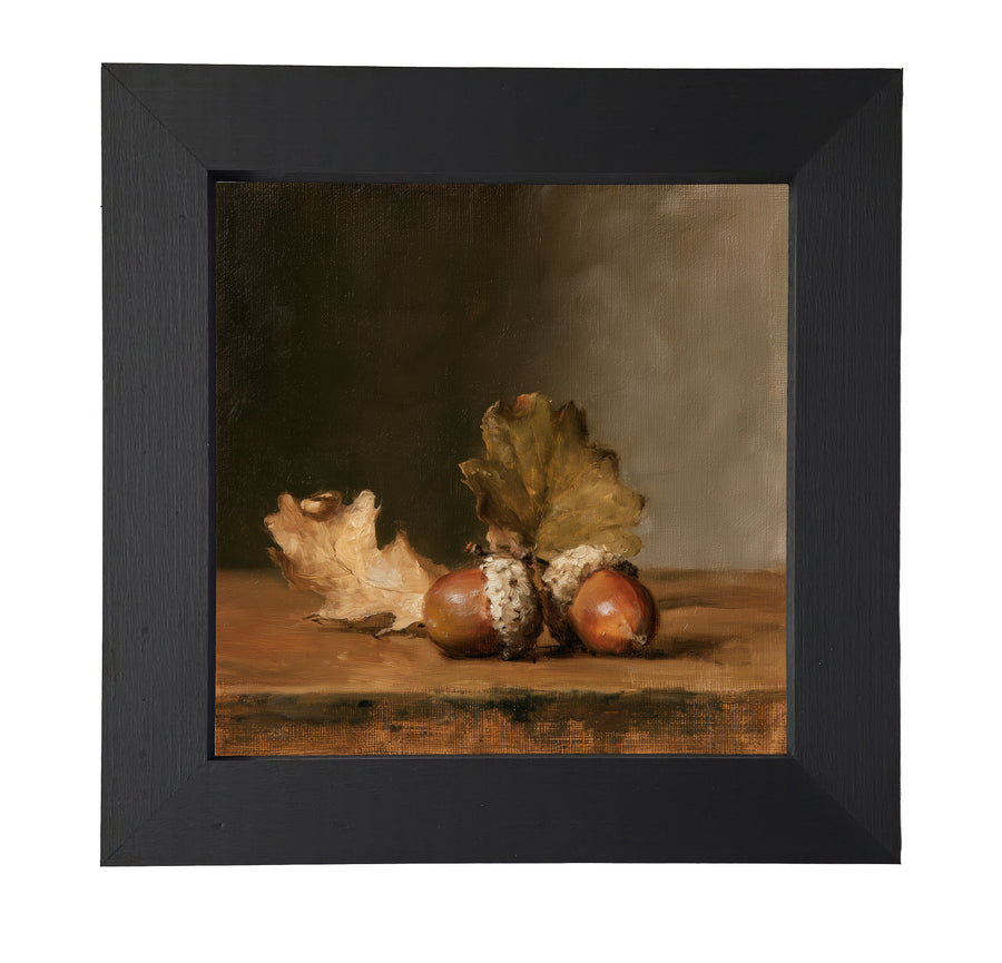 Painterly still life of acorns and dried oak leaves in earthy autumn colors