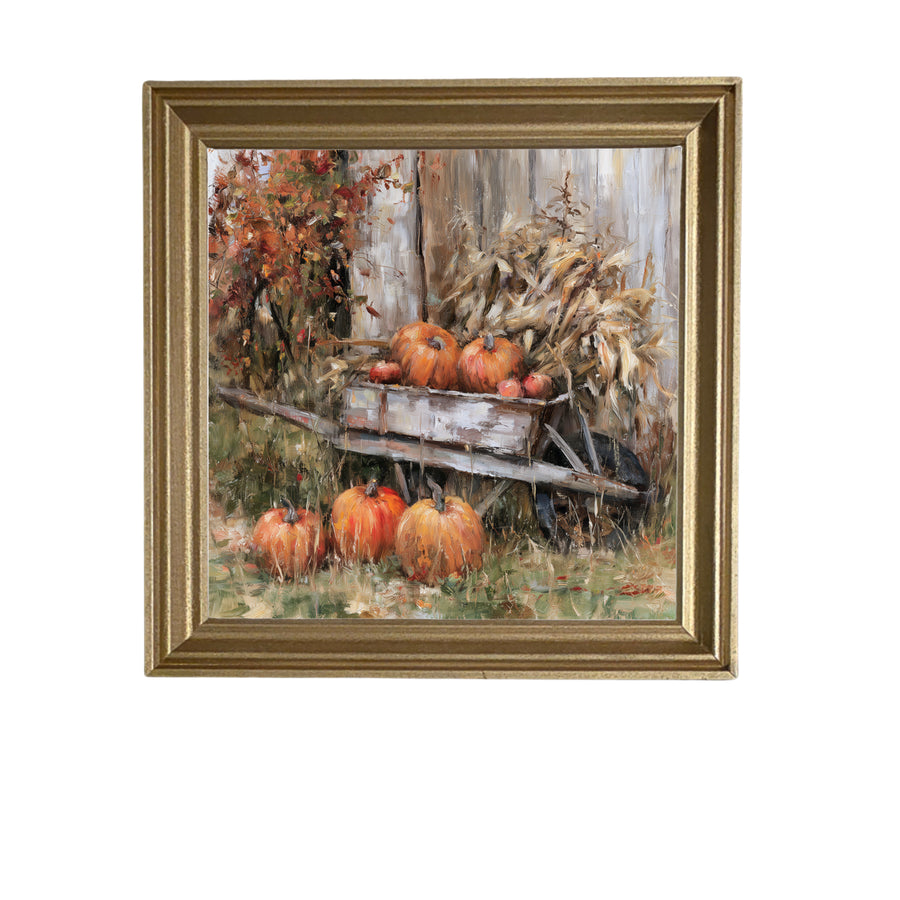 rustic wheelbarrow filled with pumpkins in autumn farmhouse style