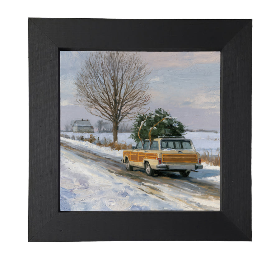 A rustic farmhouse-style framed artwork depicting a freshly cut Christmas tree tied to a car, evoking holiday tradition. — product view 7