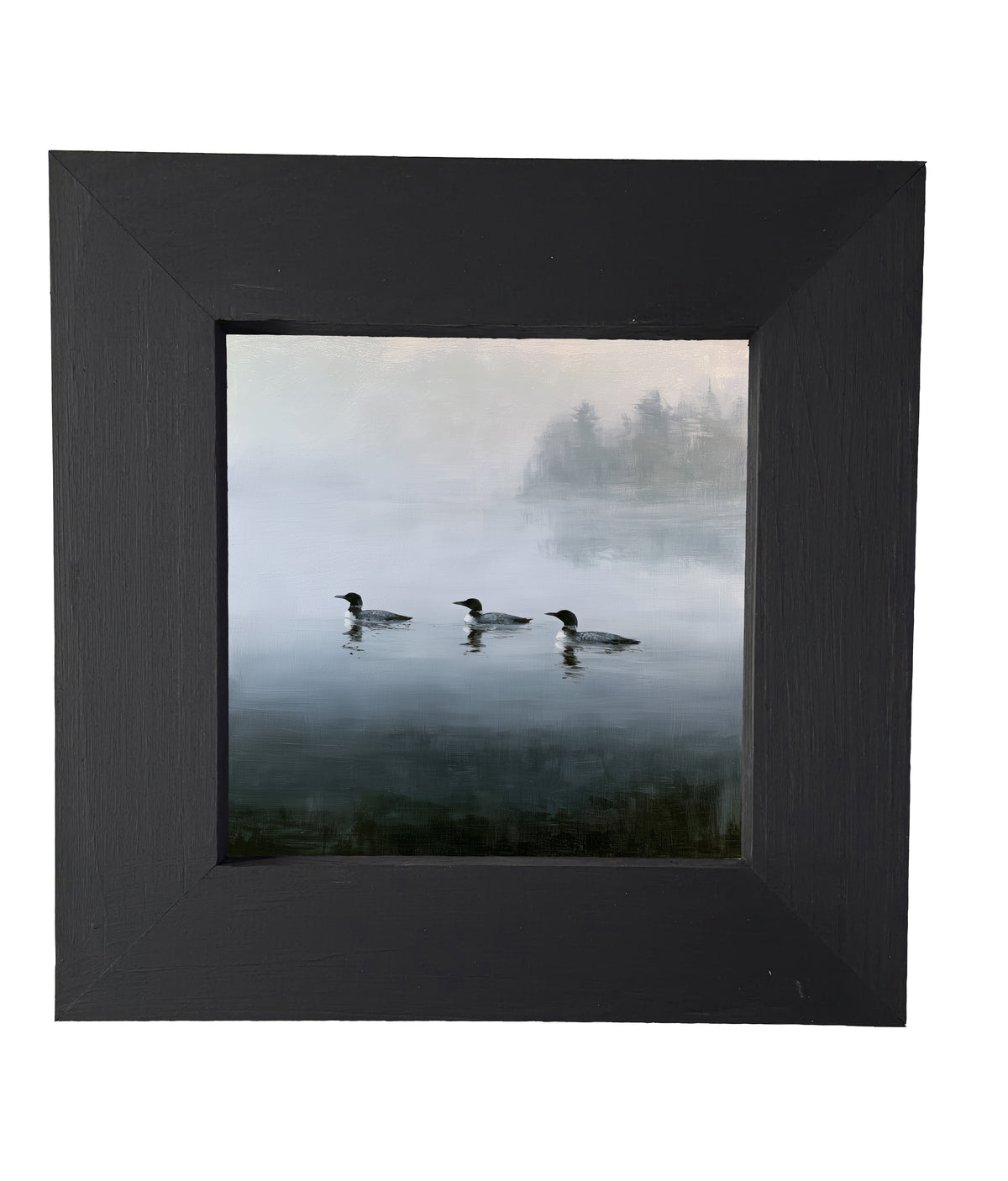 Three common loons floating together on a tranquil lake in a rustic black and white framed print — product view 5