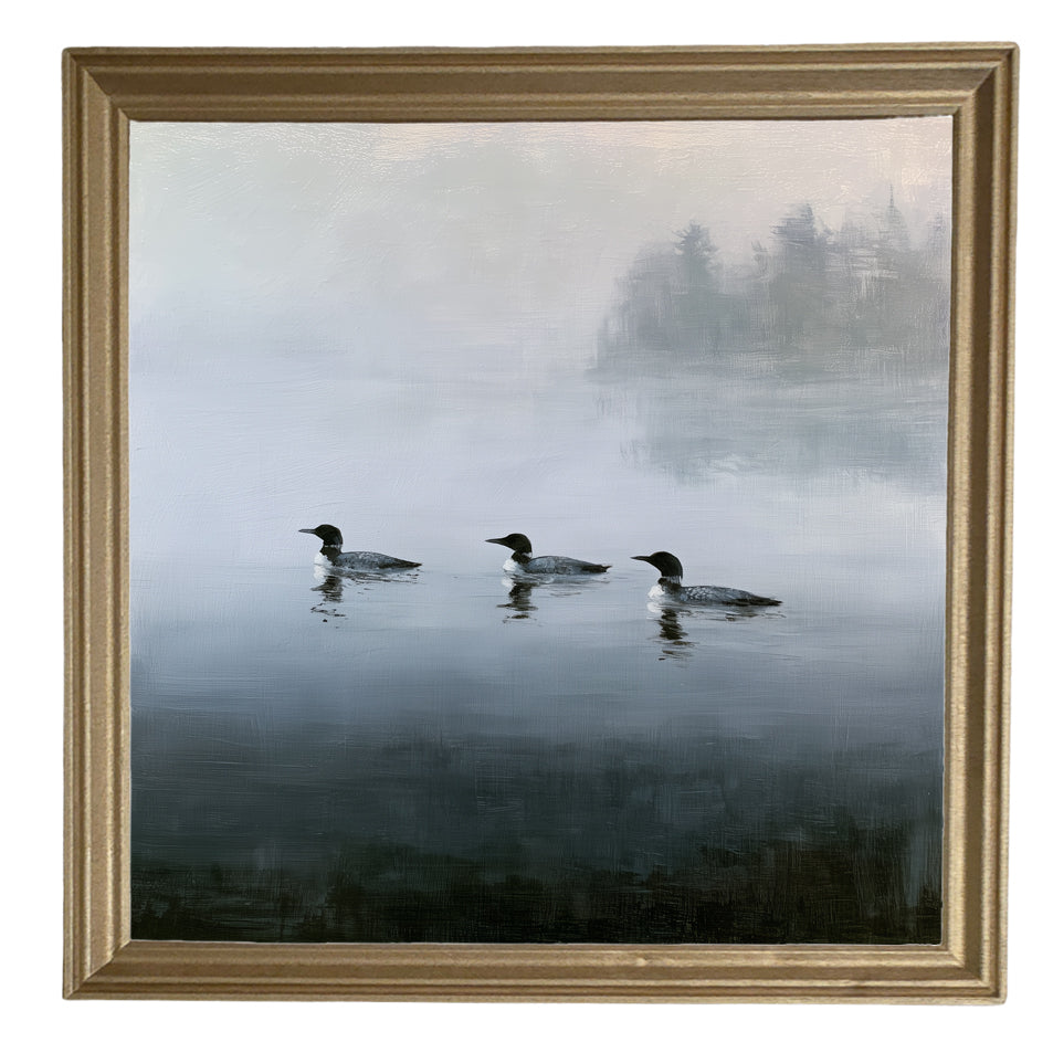 Three common loons floating together on a tranquil lake in a rustic black and white framed print — product view 8