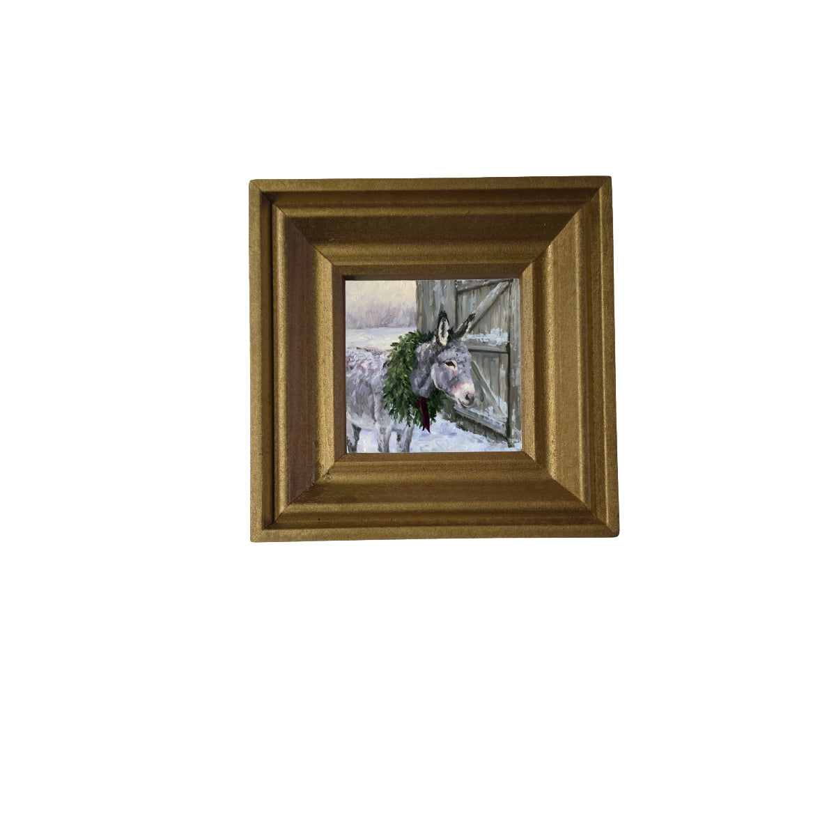 Gentle gray donkey standing peacefully, framed in farmhouse-style for Christmas